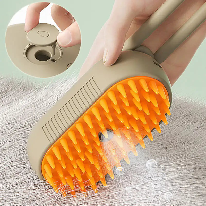 Pet grooming brush with orange bristles being used on a surface, close-up inset showing the brush head.
