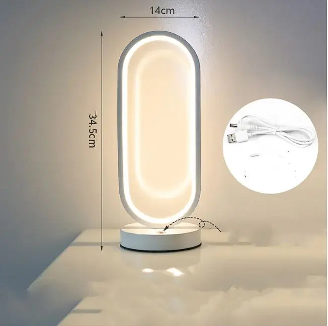 Modern table lamp with dimensions and USB cable inset on a neutral background