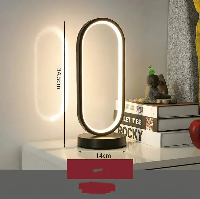 Modern table lamp with dimensions displayed on a neutral background